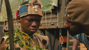 Abraham Attah and Idris Elba in BEASTS OF NO NATION